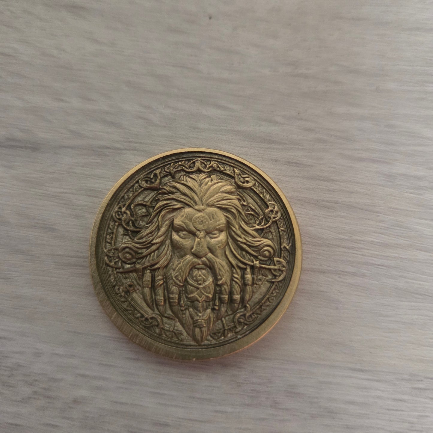 Bronze coin with intricate design