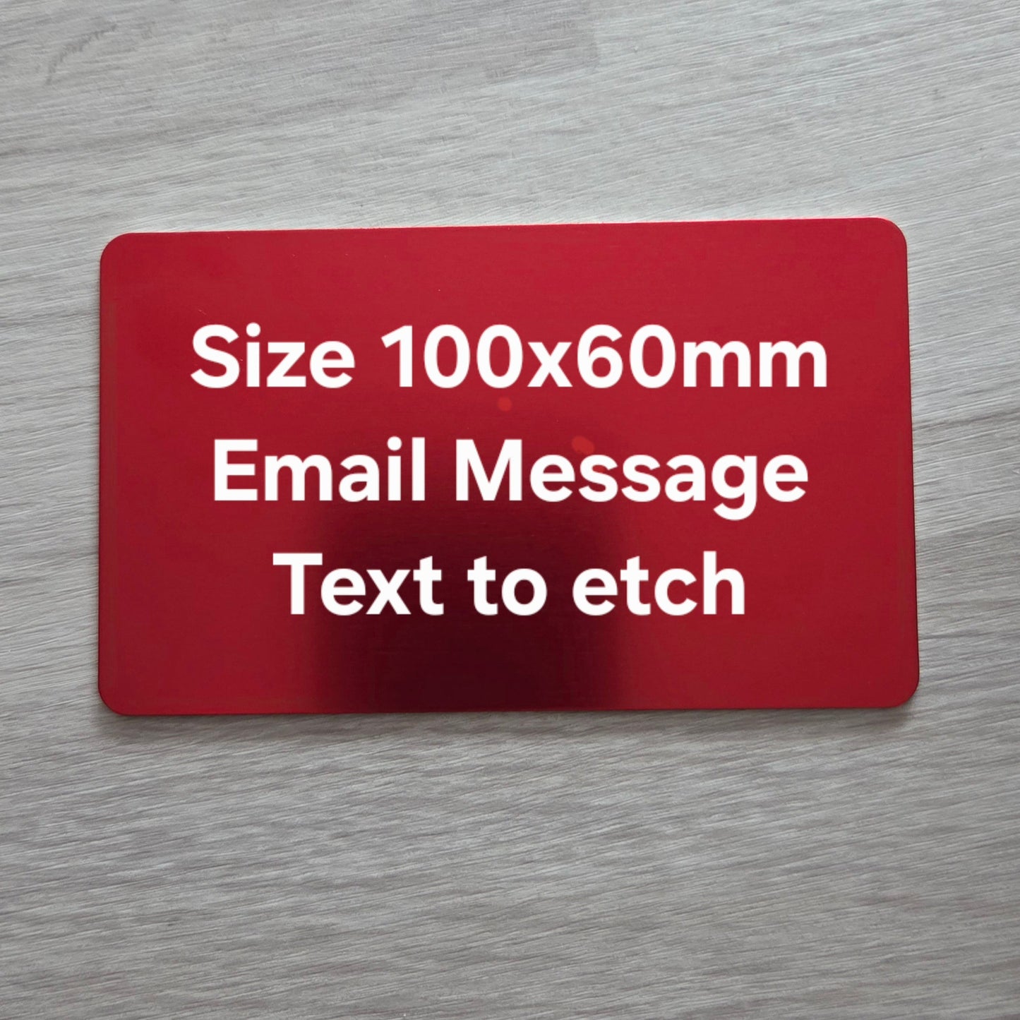 Red card with text on a gray surface