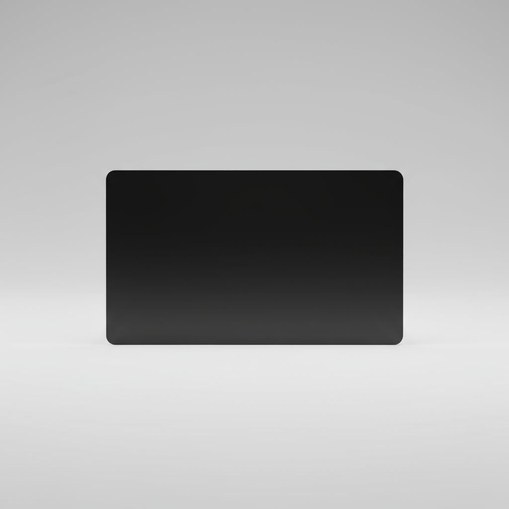 Black rectangular card on a light wooden surface