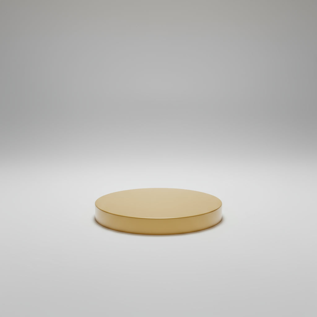 Yellow circular object on a gray wooden surface