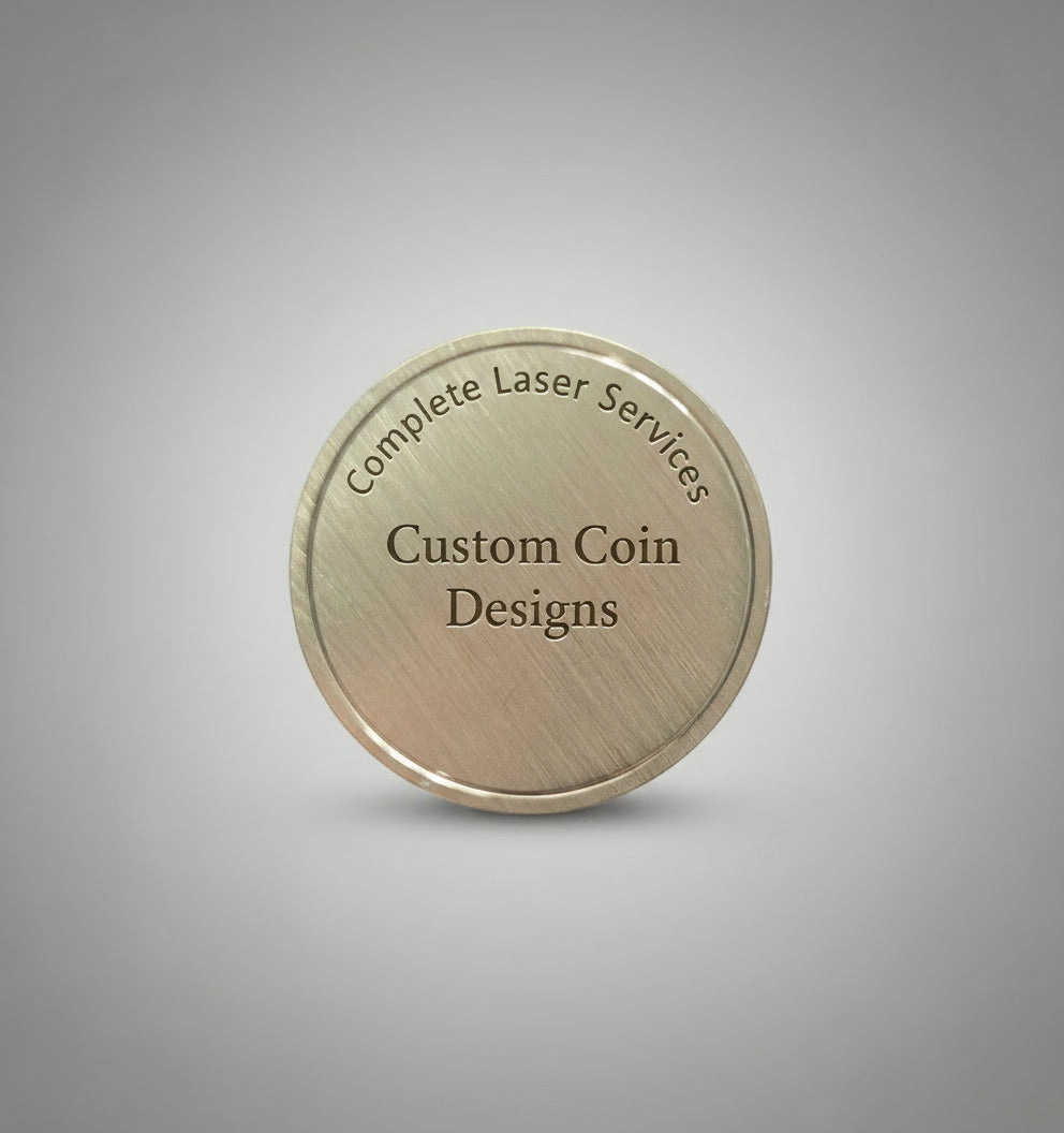 Round brass object on a gray surface