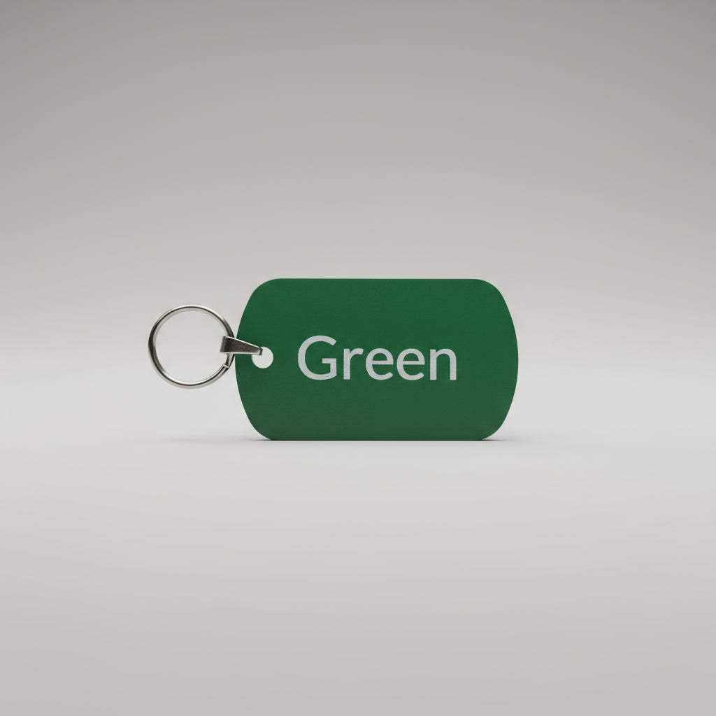 Green tag with 'Green' text on a gray surface