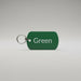 Green tag with 'Green' text on a gray surface