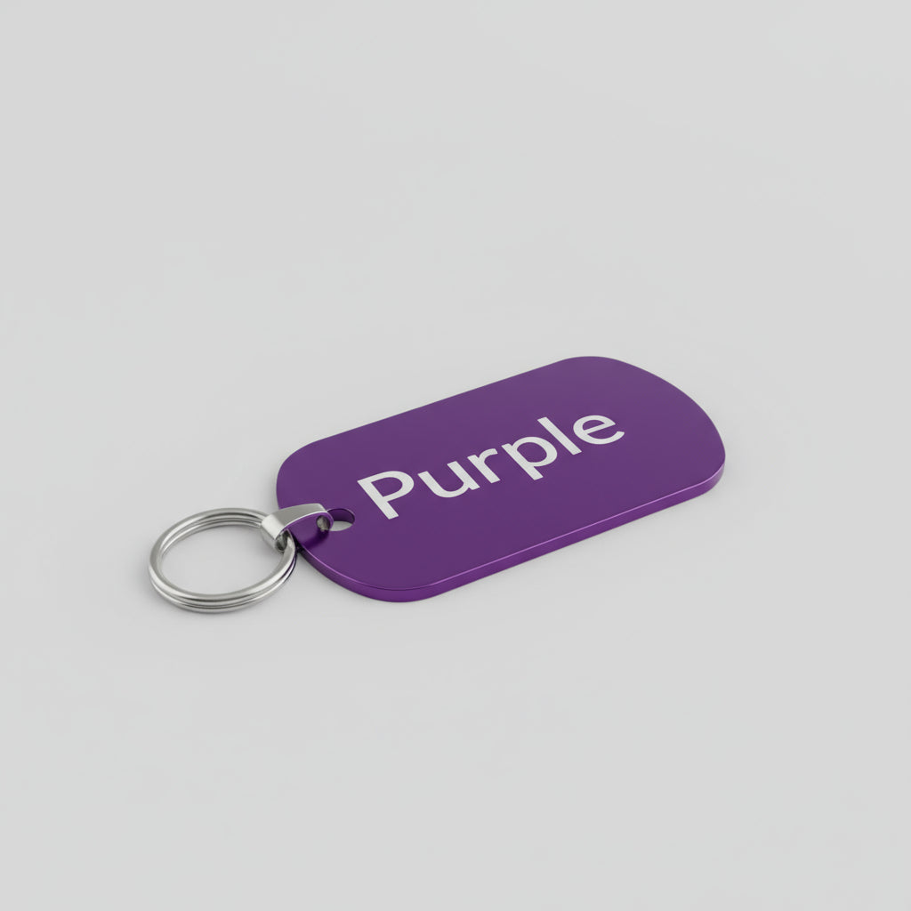 Purple tag with 'Purple' text on a gray surface