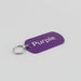 Purple tag with 'Purple' text on a gray surface