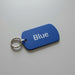 Blue tag with 'Blue' text on a gray surface