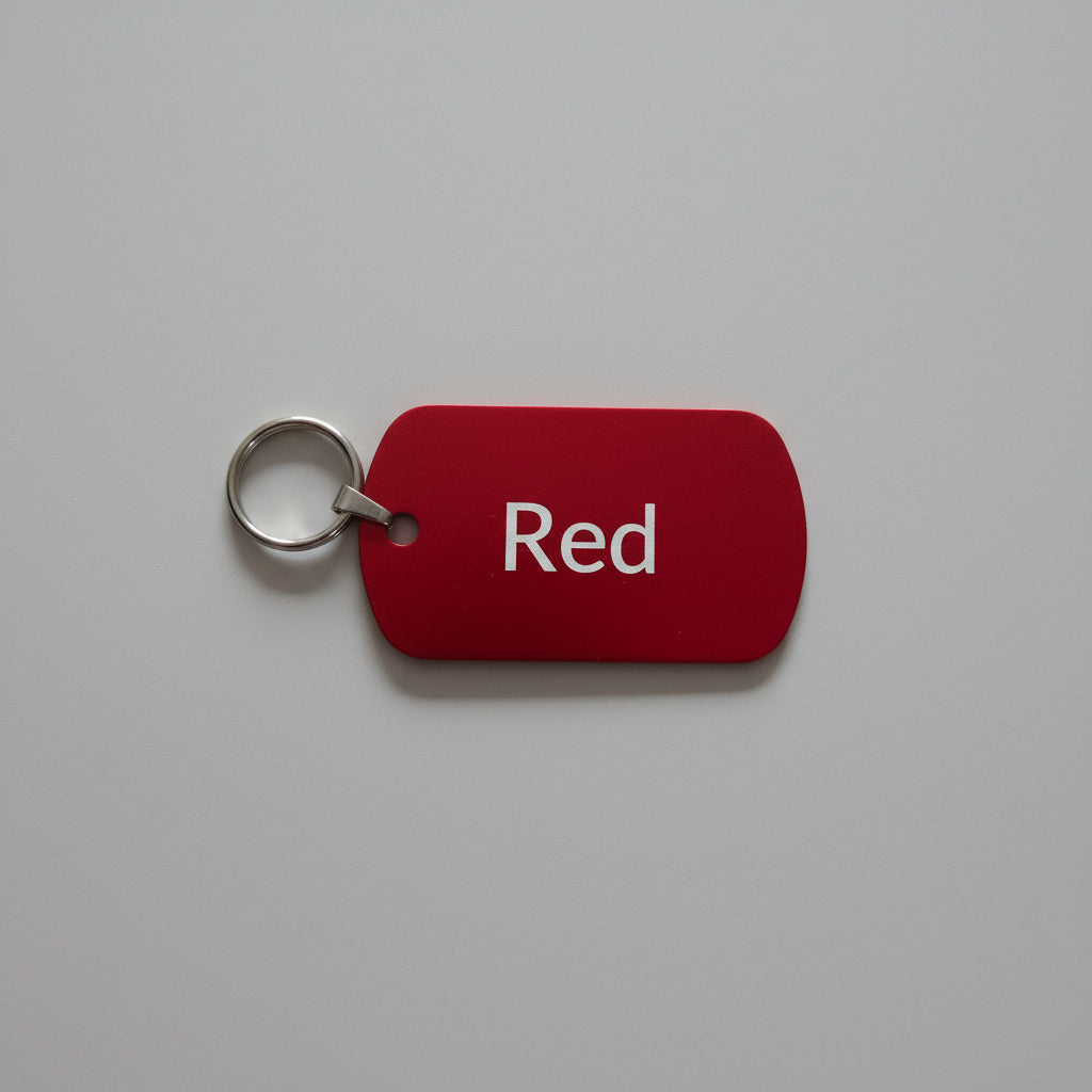 Red key tag with 'Red' text on a gray surface