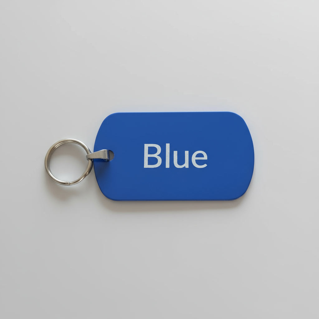 Blue tag with 'Blue' text on a gray wooden surface