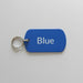 Blue tag with 'Blue' text on a gray wooden surface