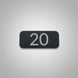 Black rectangular sign with the number 20 on a gray wooden surface