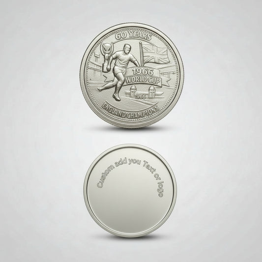 Silver coin with engraved design on a wooden surface